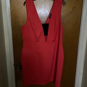 Red/orange dress with a black band